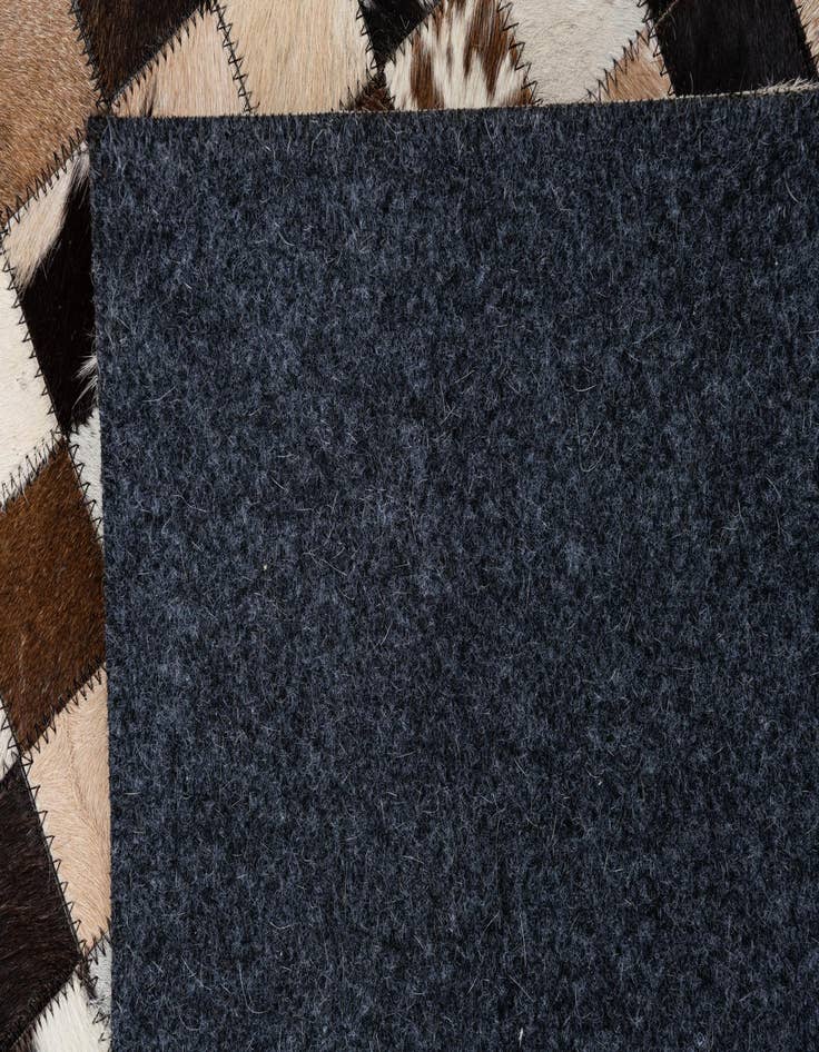 Detail image of  5' 2 x 8' 2 Cowhide Leather Rug