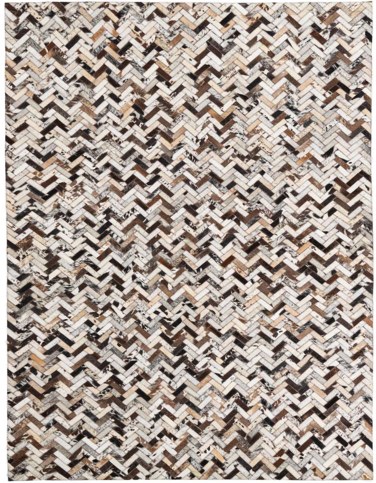 A 5x8 rectangular Cowhide Leather rug featuring a modern multi-colored herringbone stripe pattern in natural browns, creams, and grays.