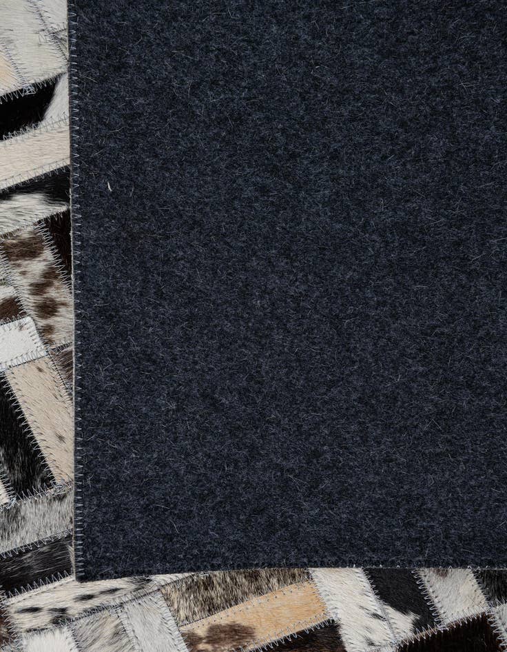 Detail image of  5' 3 x 7' 10 Cowhide Leather Rug