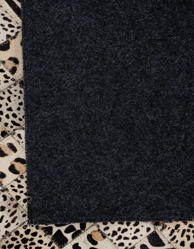 Detail image of  5' 1 x 8' 1 Cowhide Leather Rug