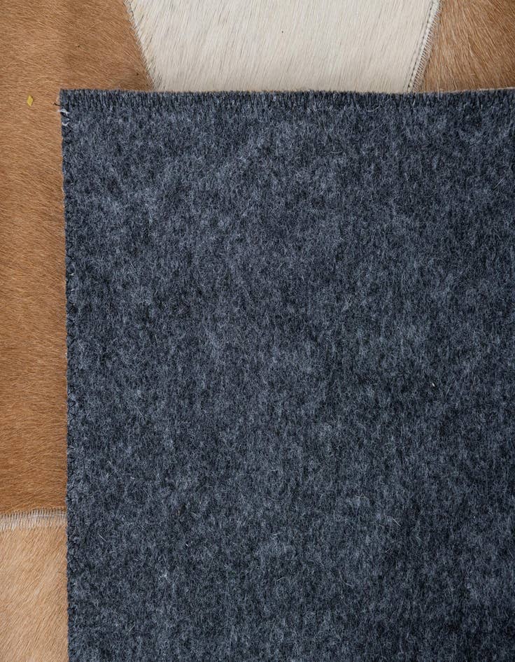 Detail image of  4' 10 x 8' Cowhide Leather Rug