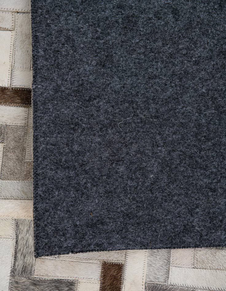 Detail image of  5' 4 x 7' 6 Cowhide Leather Rug