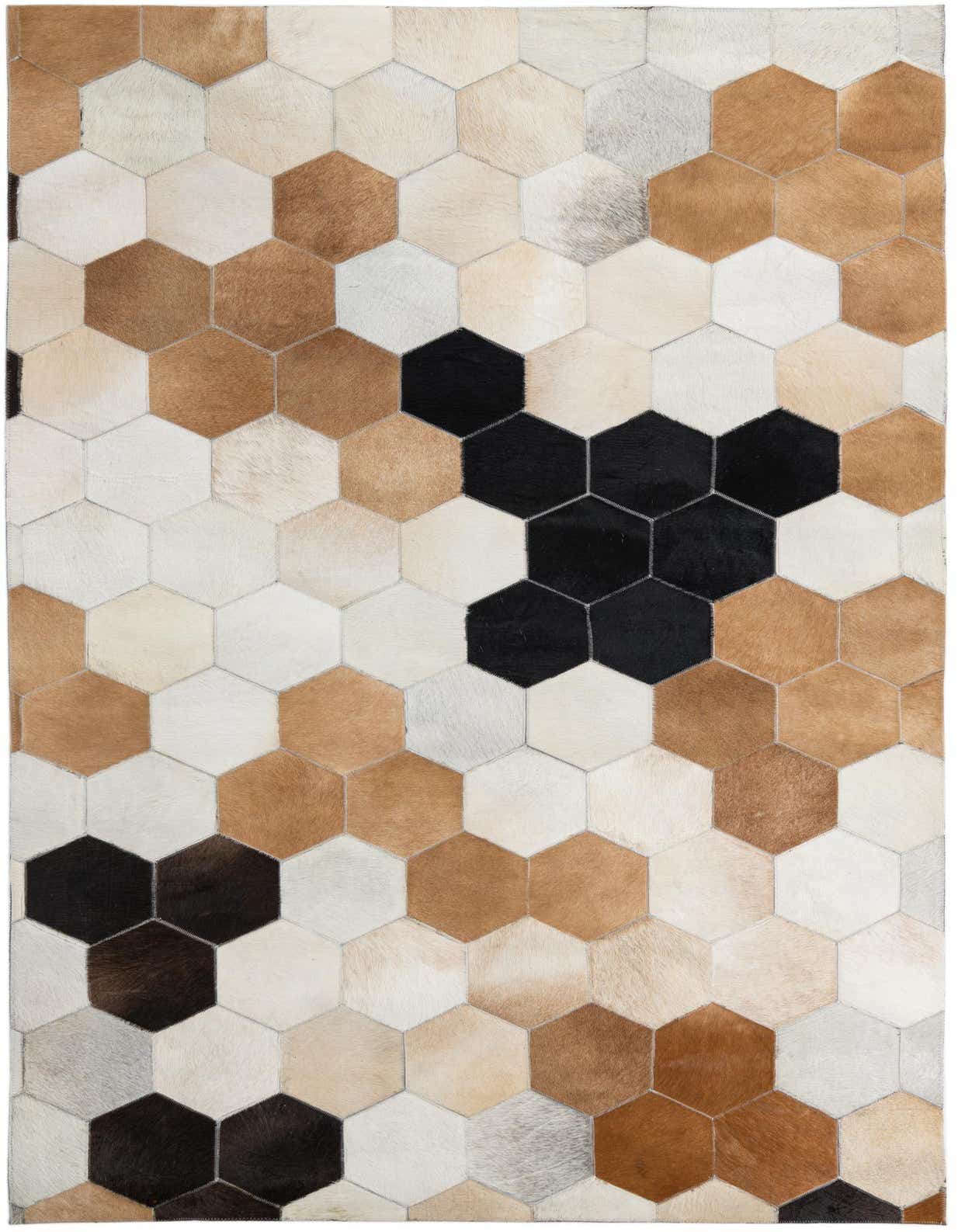 A rectangular 5x8 modern cowhide rug featuring a geometric pattern of multi-colored hexagonal patches in shades of brown, white, and black.