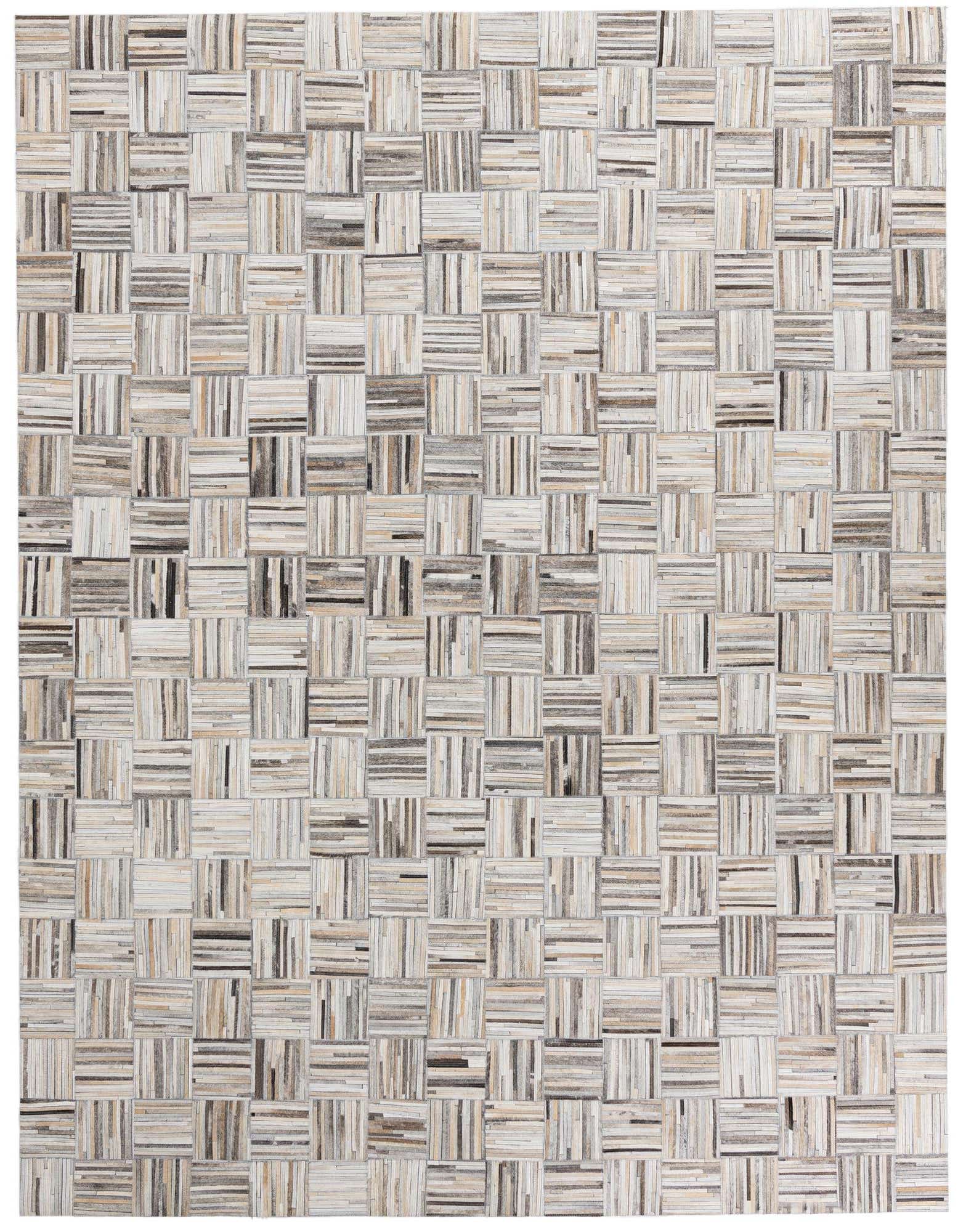 A rectangular 8x10 multi-colored modern rug made from cowhide and leather, featuring a mosaic of small striped squares.