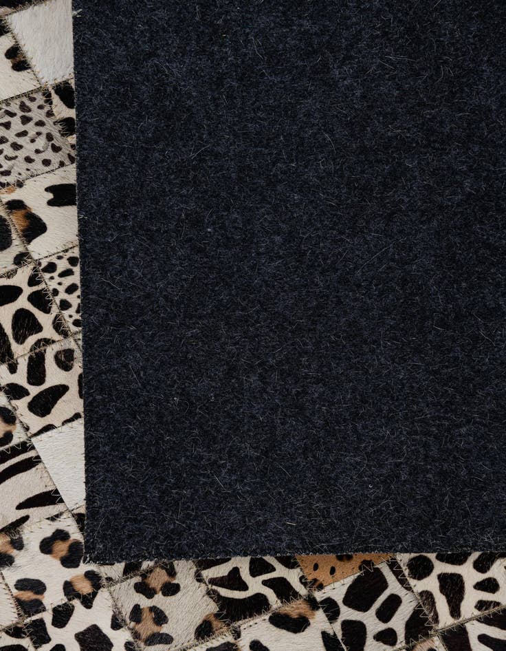 Detail image of  5' x 7' 10 Cowhide Leather Rug