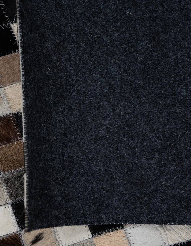 Detail image of  5' x 7' 10 Cowhide Leather Rug