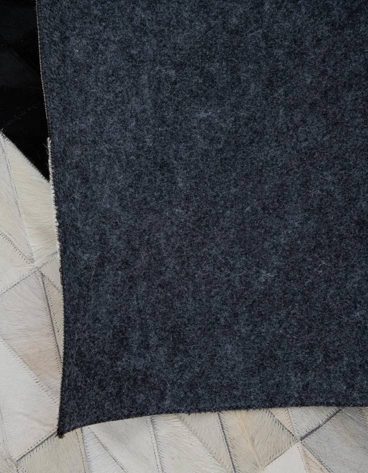 Detail image of  5' x 7' 10 Cowhide Leather Rug