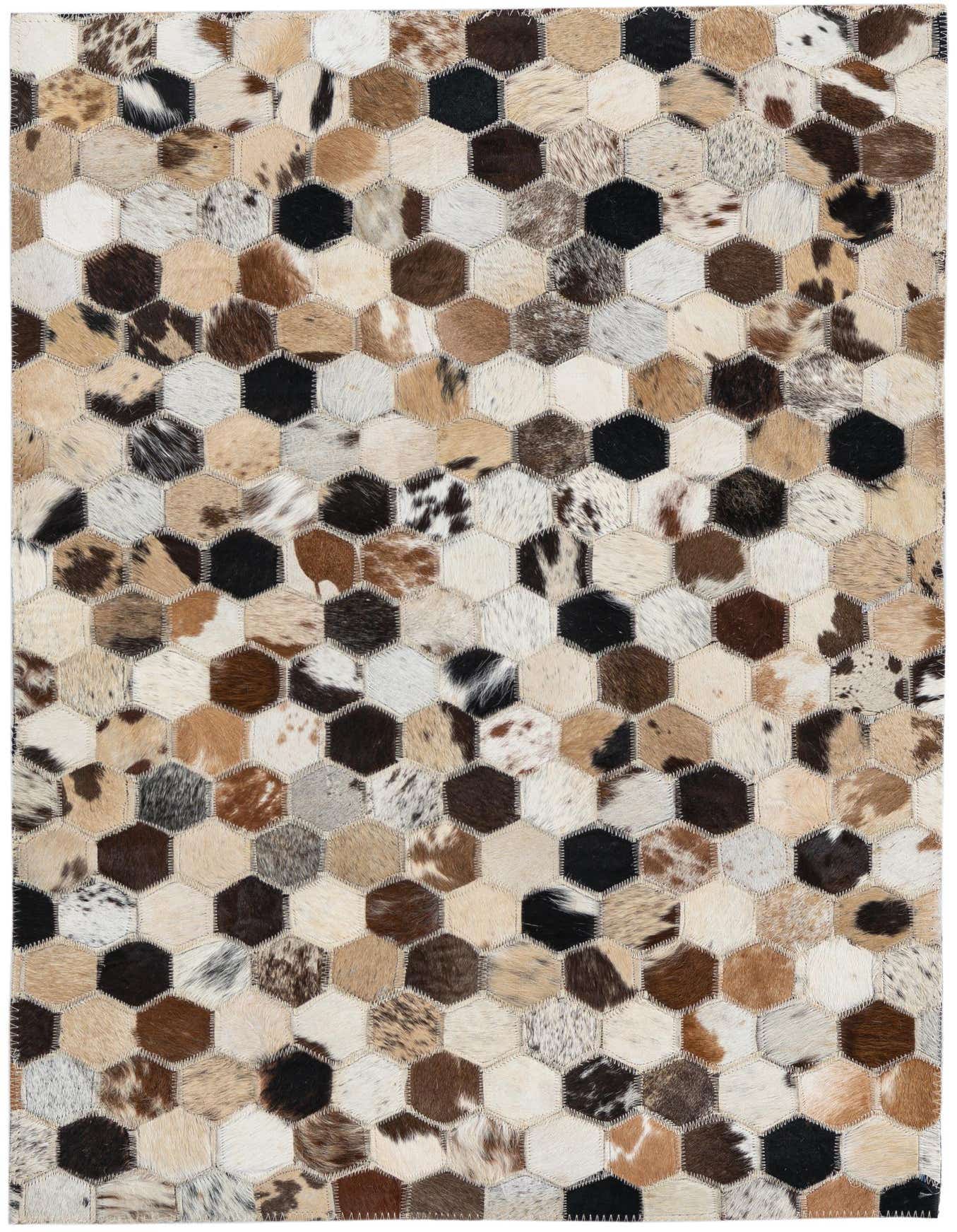 A 2x3 rectangular Cowhide Leather rug featuring a modern hexagonal patchwork pattern in multi-colored natural cowhide.