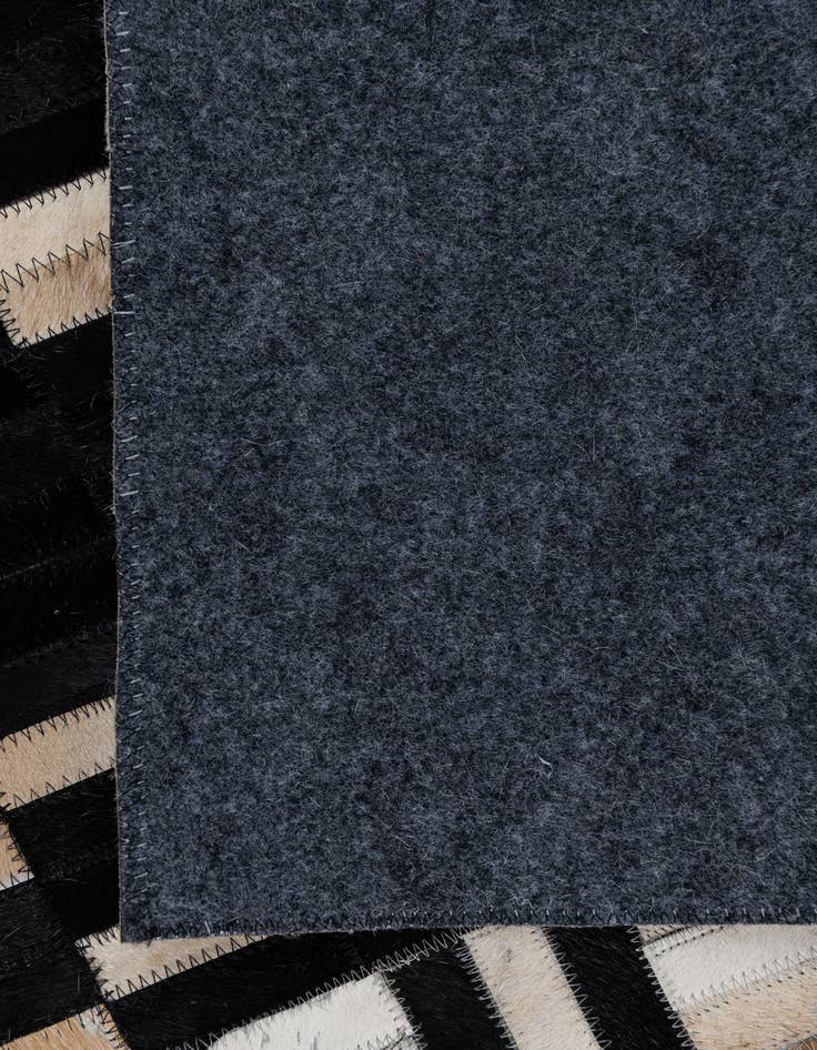 Detail image of  5' x 7' 10 Cowhide Leather Rug