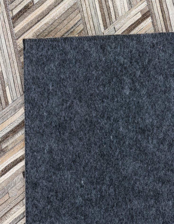 Detail image of  4' 10 x 7' 9 Cowhide Leather Rug