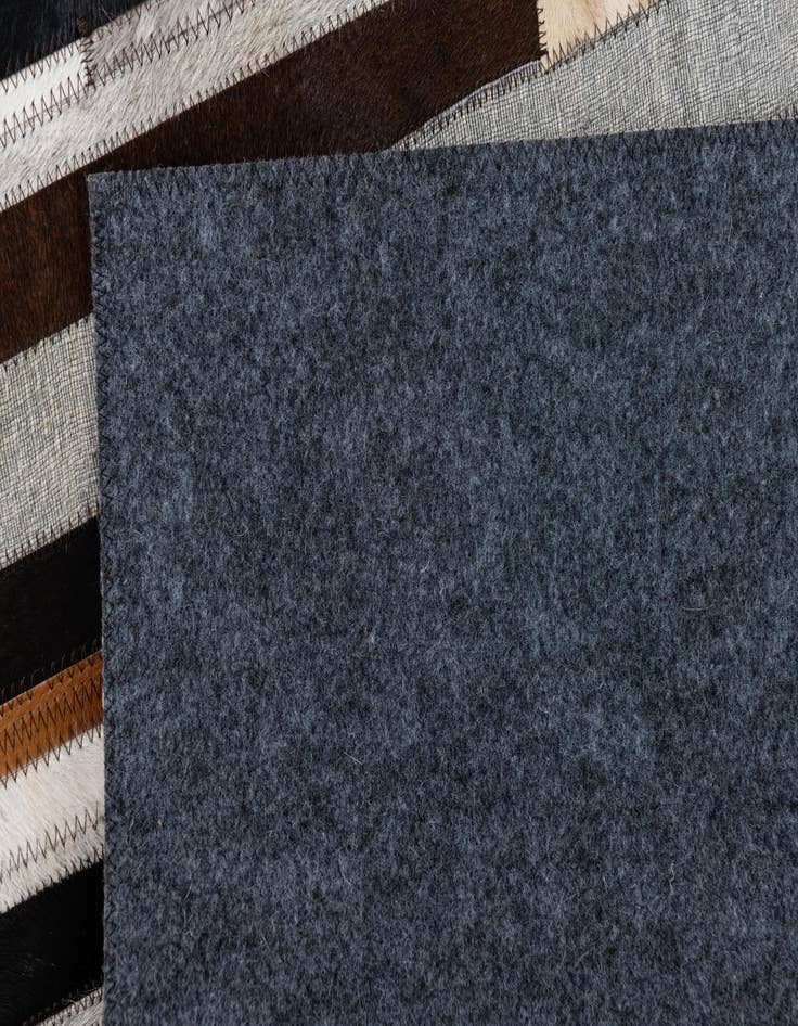 Detail image of  5' x 7' 10 Cowhide Leather Rug