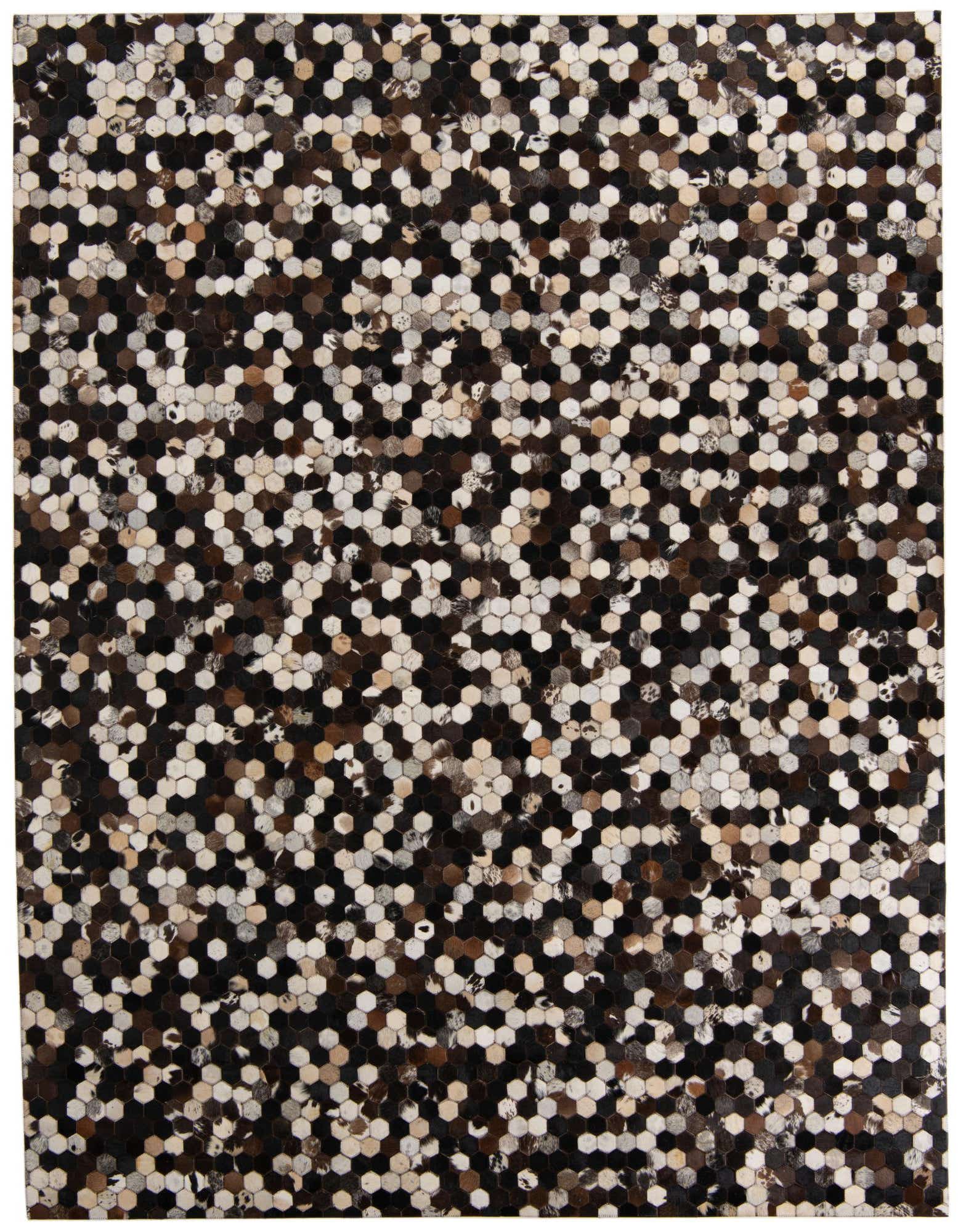 A rectangular 8x10 multi-colored cowhide rug with a modern abstract hexagonal pattern in black, brown, and white tones.
