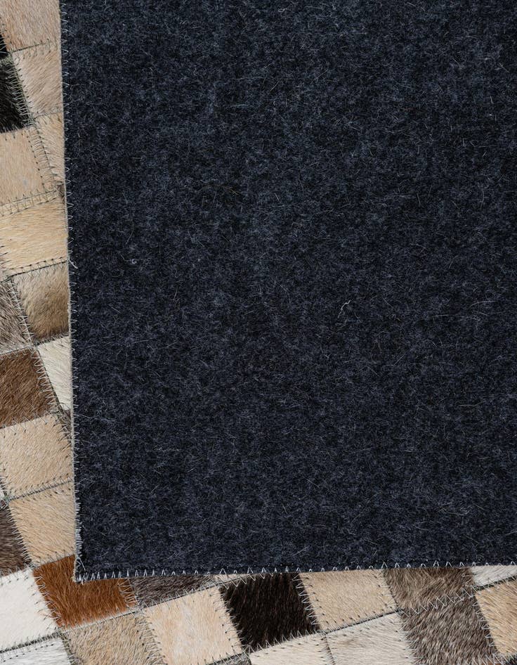 Detail image of  5' x 7' 10 Cowhide Leather Rug