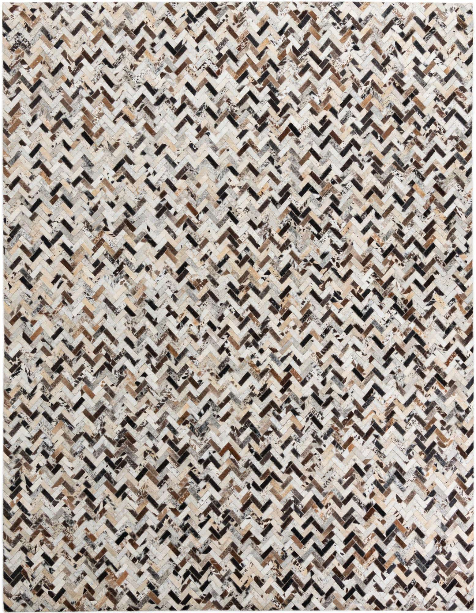A rectangular 8x10 multi-colored cowhide leather rug with a modern chevron stripe pattern, perfect for a living room.