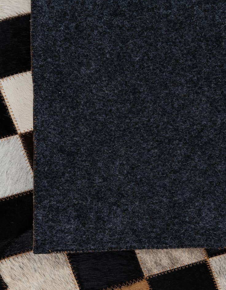 Detail image of  5' x 7' 10 Cowhide Leather Rug