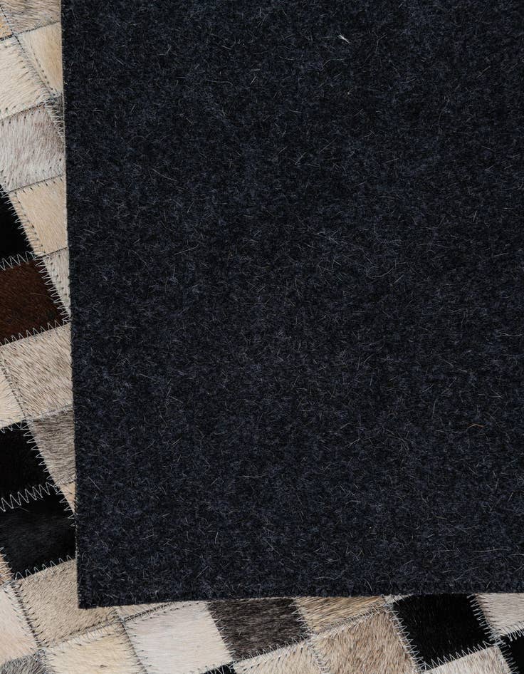 Detail image of  5' x 7' 9 Cowhide Leather Rug