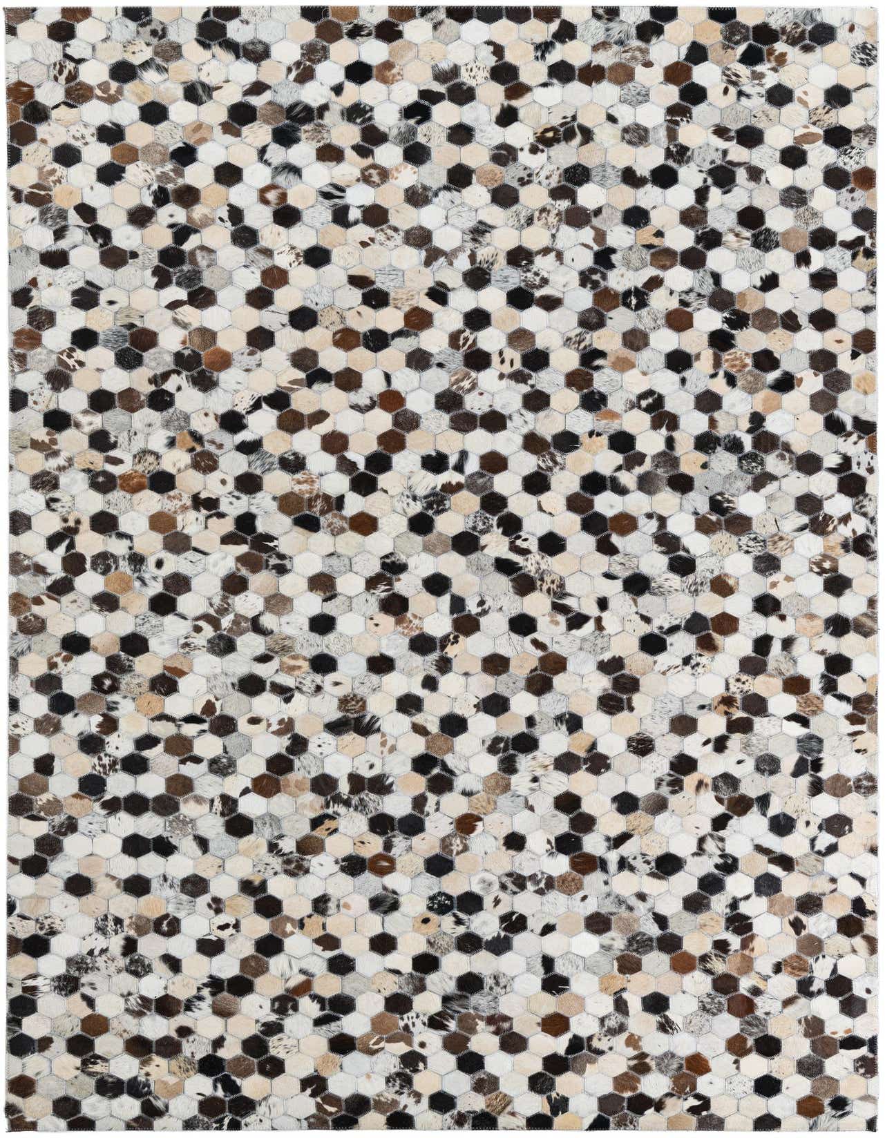 A rectangular 5x8 modern cowhide rug with a mosaic of multi-colored hexagonal leather patches in shades of white, black, brown, and beige.