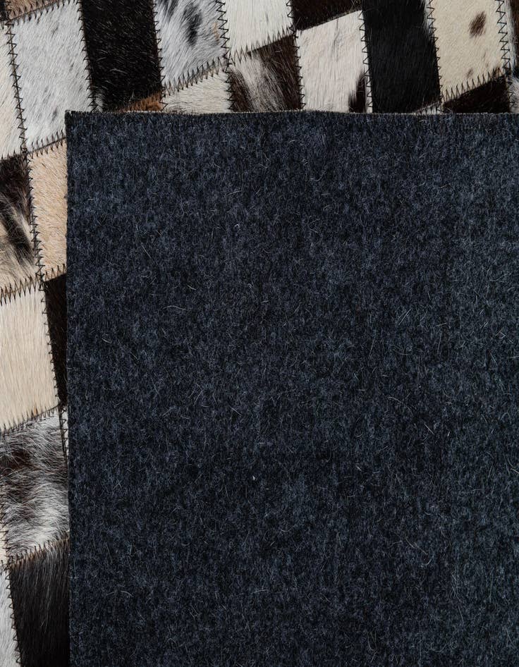 Detail image of  5' x 7' 10 Cowhide Leather Rug