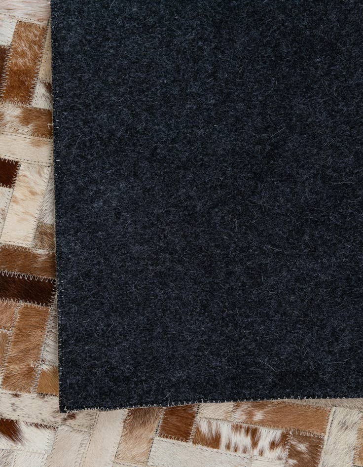 Detail image of  5' 1 x 8' Cowhide Leather Rug