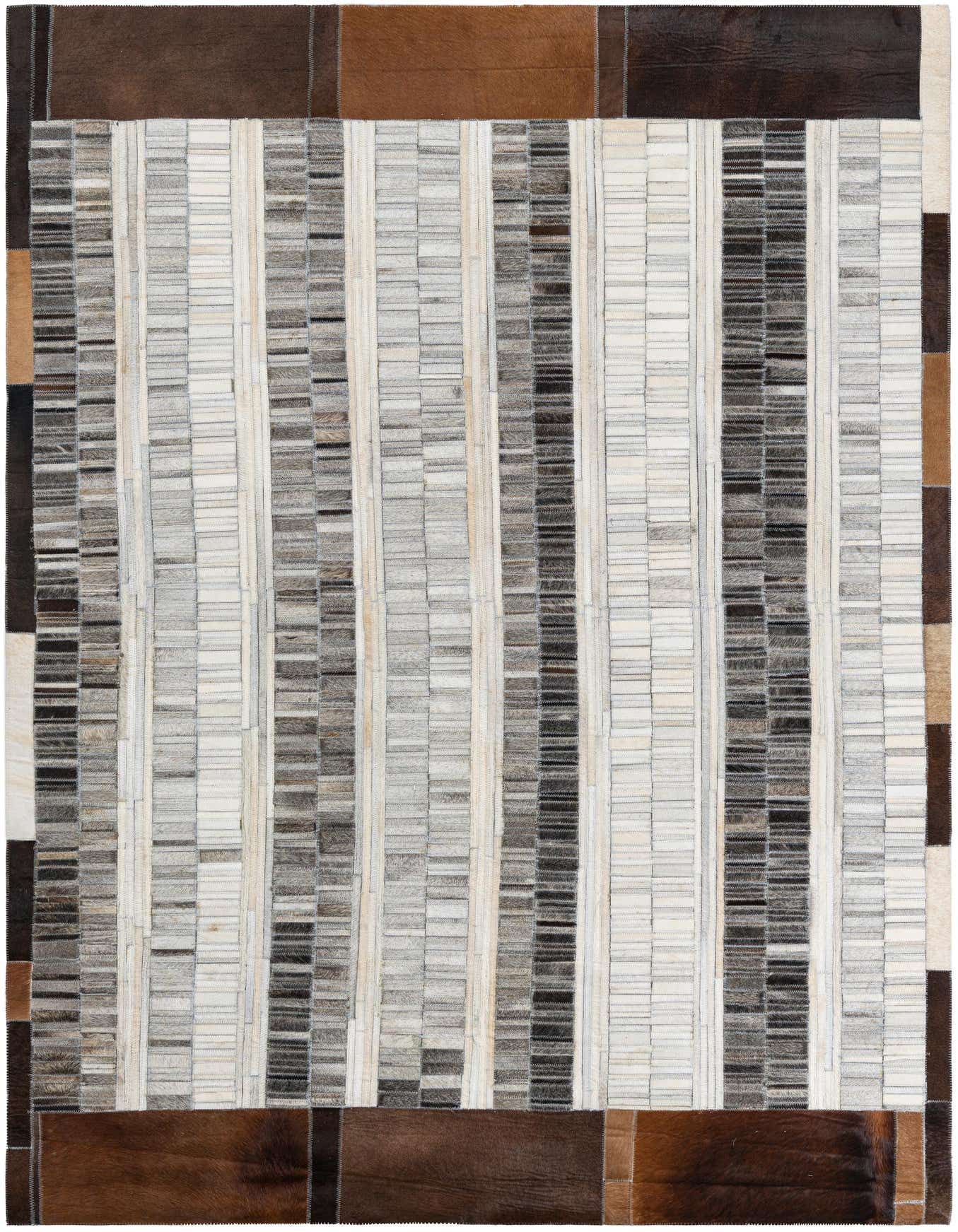 A rectangular 5x8 modern cowhide rug with vertical stripes of white, grey, and black, framed by a brown leather border.