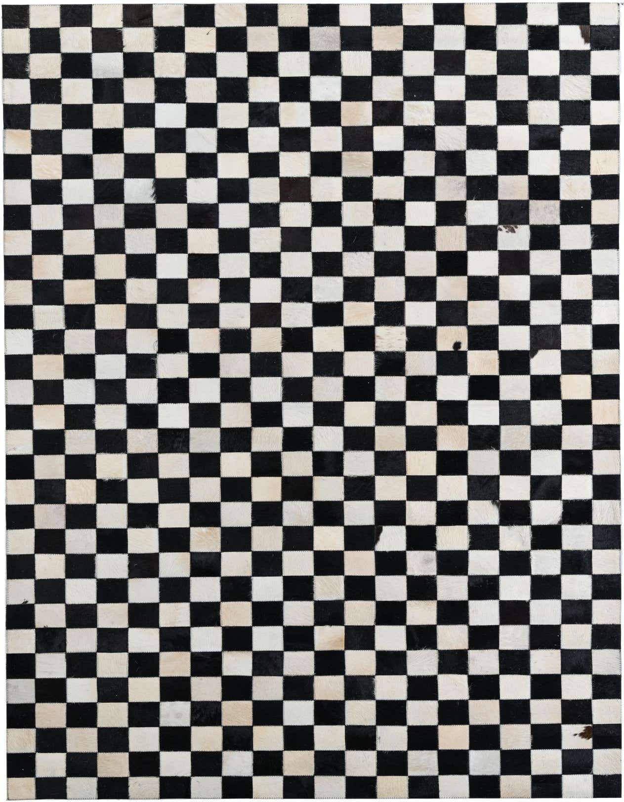 A 5x8 rectangular black and white checkered cowhide rug with a modern, abstract pattern, suitable for a living room.