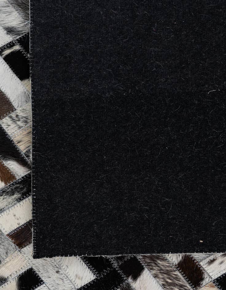 Detail image of  5' x 7' 10 Cowhide Leather Rug