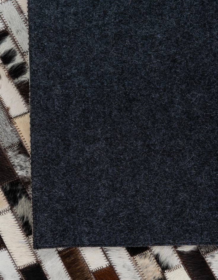 Detail image of  5' x 7' 10 Cowhide Leather Rug