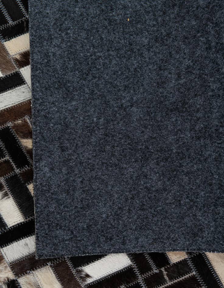 Detail image of  5' x 7' 10 Cowhide Leather Rug