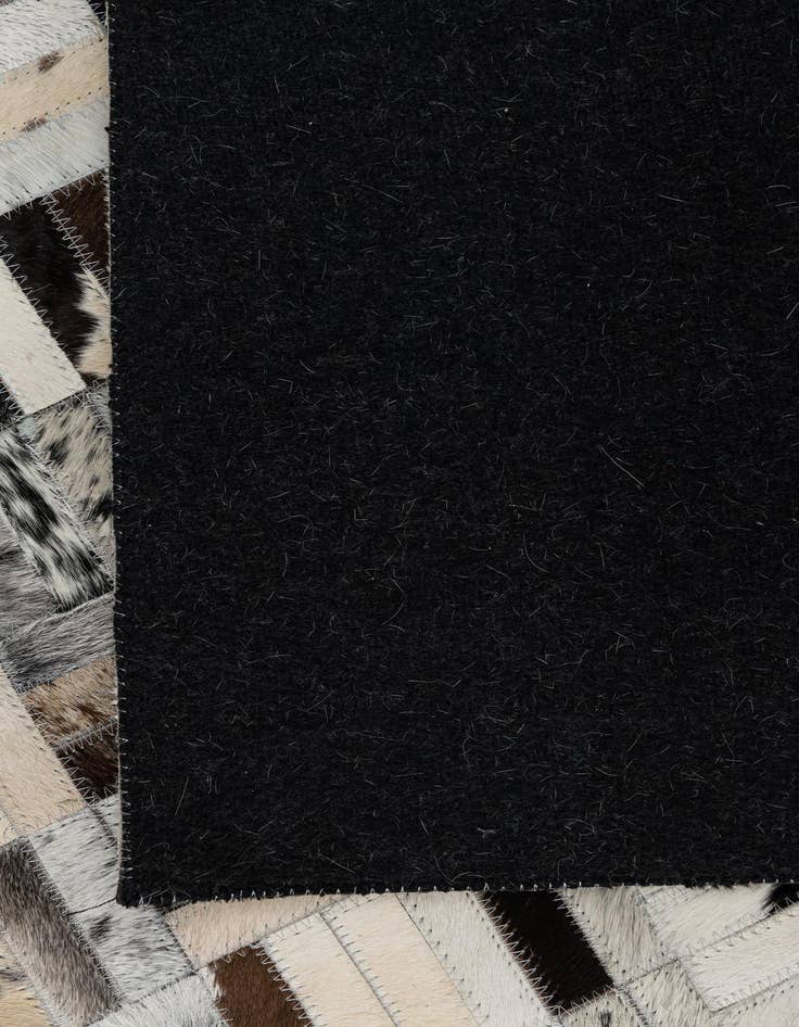 Detail image of  5' x 7' 9 Cowhide Leather Rug