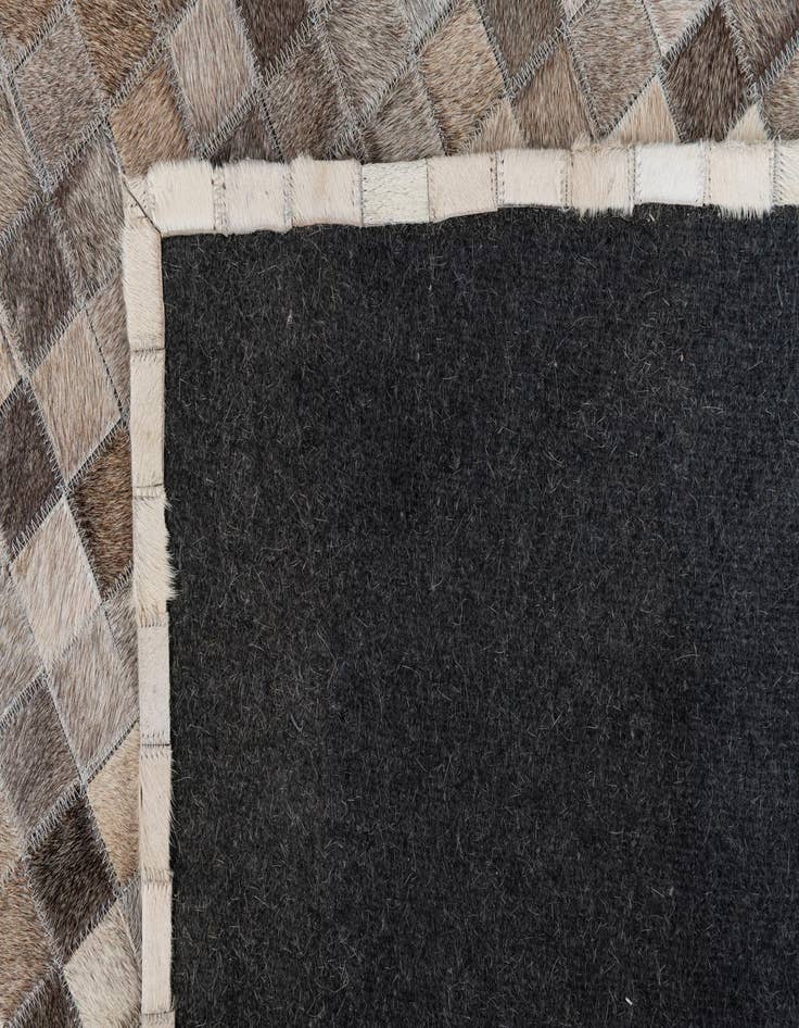 Detail image of  5' 3 x 7' 8 Cowhide Leather Rug