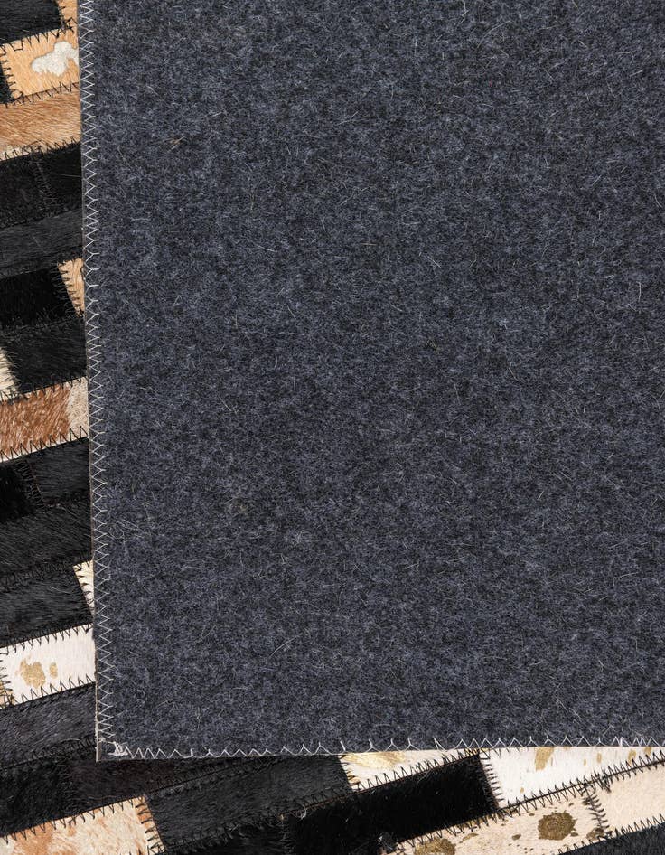 Detail image of  5' x 7' 9 Cowhide Leather Rug