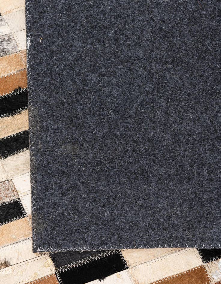 Detail image of  5' x 7' 10 Cowhide Leather Rug