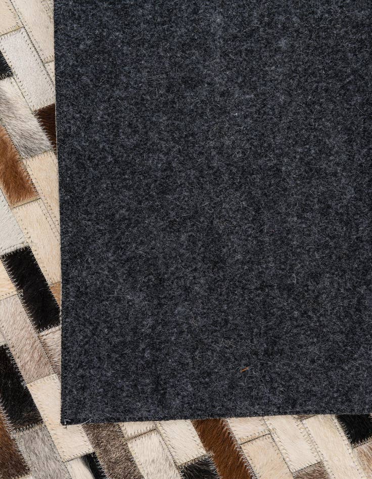 Detail image of  5' x 7' 10 Cowhide Leather Rug