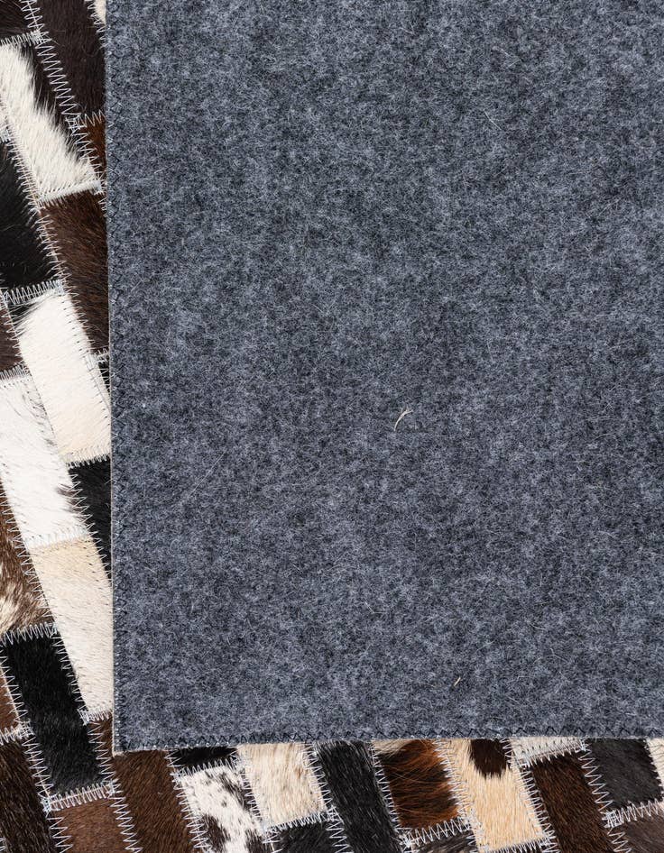 Detail image of  5' x 7' 10 Cowhide Leather Rug