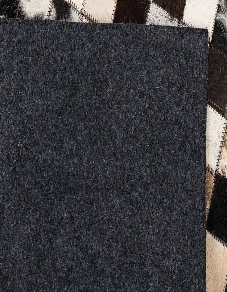 Detail image of  5' 1 x 8' Cowhide Leather Rug