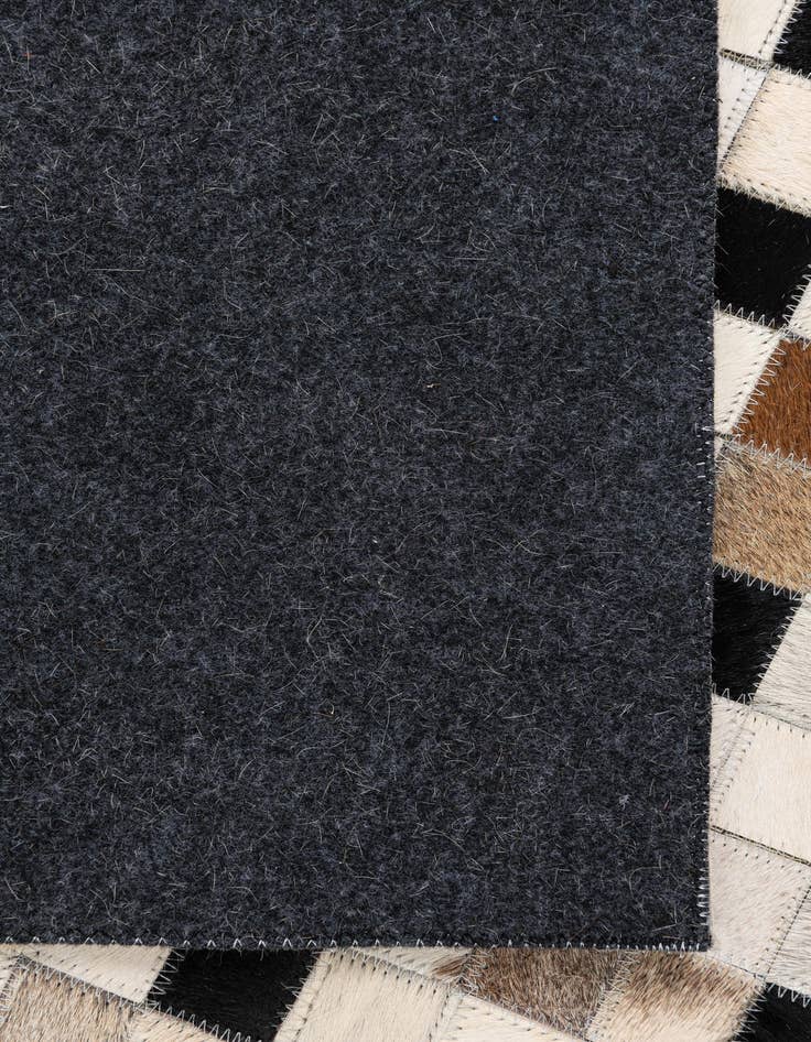 Detail image of  5' x 7' 10 Cowhide Leather Rug