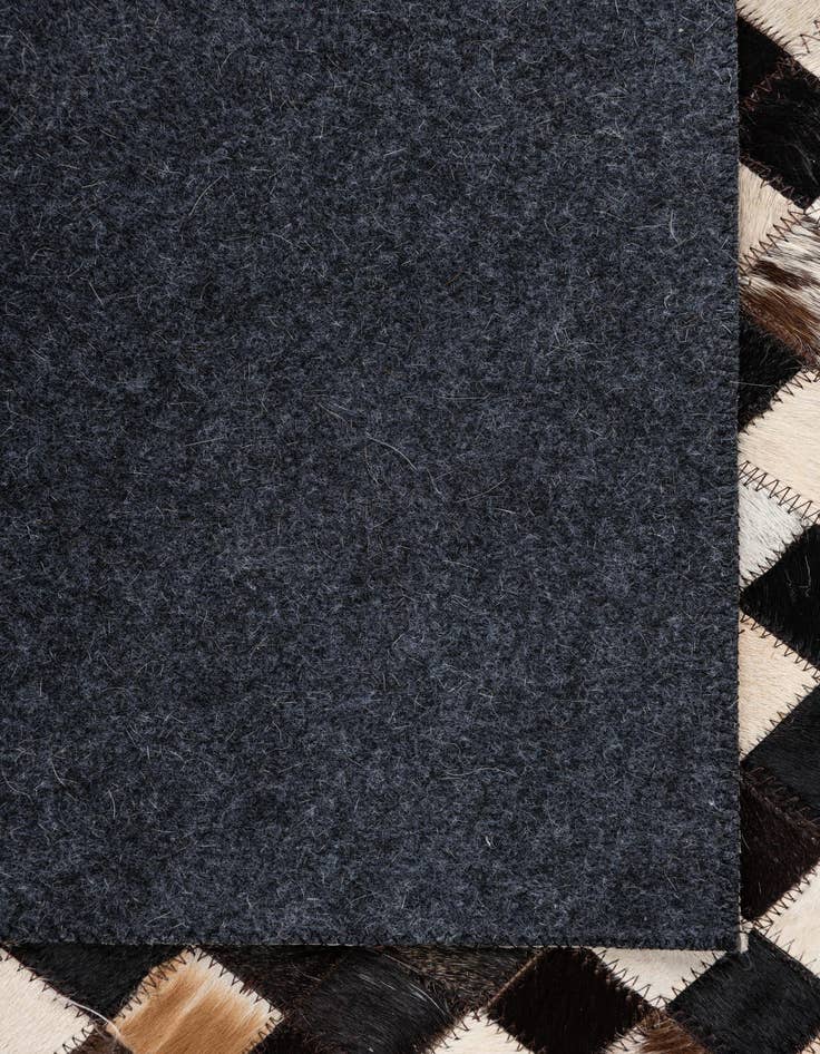 Detail image of  5' 1 x 8' 1 Cowhide Leather Rug