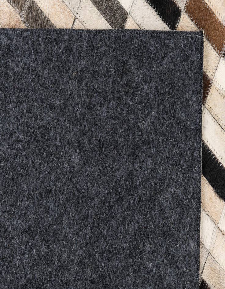 Detail image of  5' x 7' 10 Cowhide Leather Rug