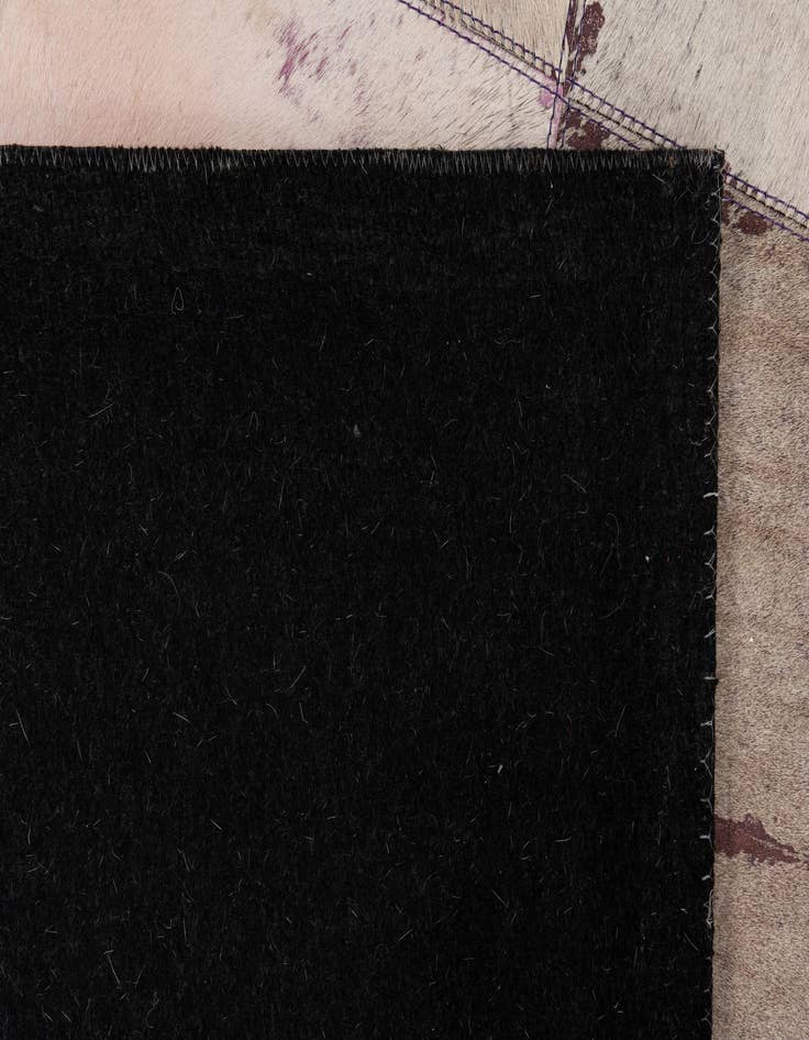 Detail image of  4' 10 x 7' 9 Cowhide Leather Rug