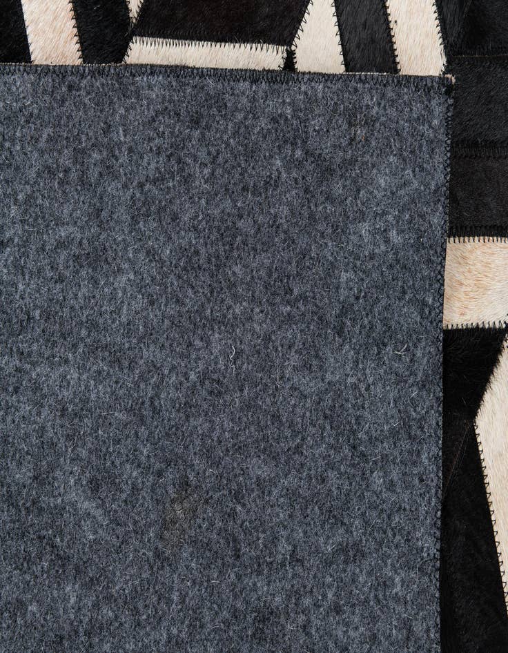 Detail image of  5' 1 x 8' 1 Cowhide Leather Rug