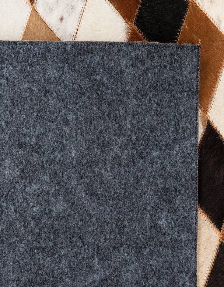 Detail image of  5' 1 x 8' 1 Cowhide Leather Rug