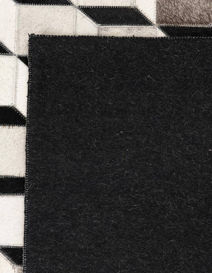 Detail image of  5' 3 x 7' 7 Cowhide Leather Rug