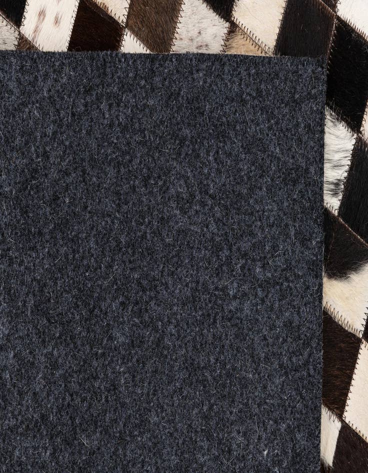 Detail image of  5' 1 x 8' Cowhide Leather Rug