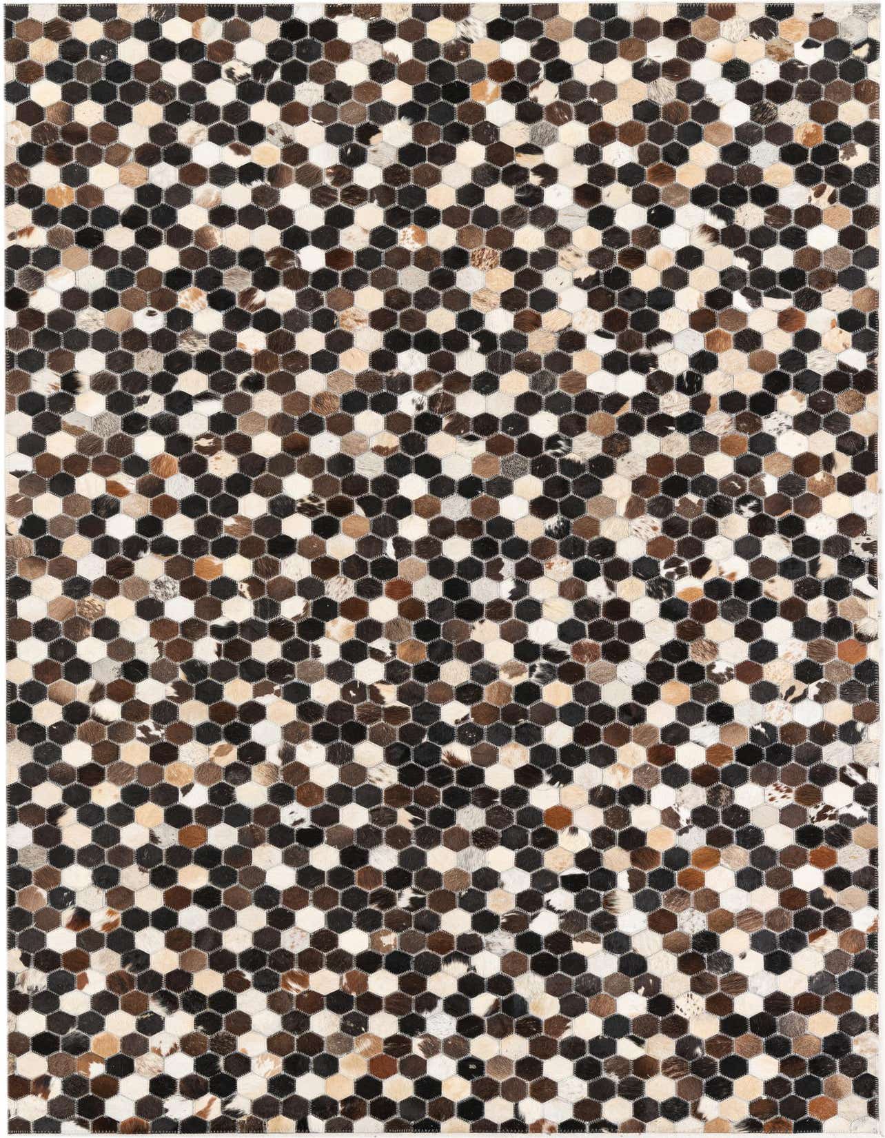 A rectangular 5x8 cowhide rug featuring a modern abstract pattern of multi-colored hexagonal leather patches.