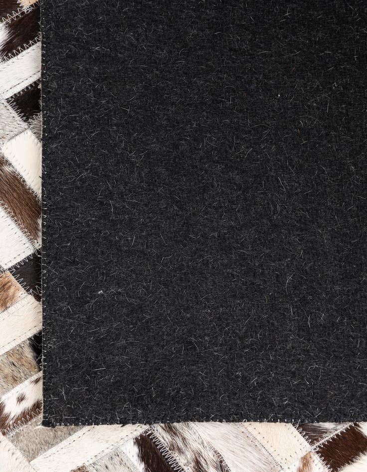 Detail image of  5' x 7' 10 Cowhide Leather Rug