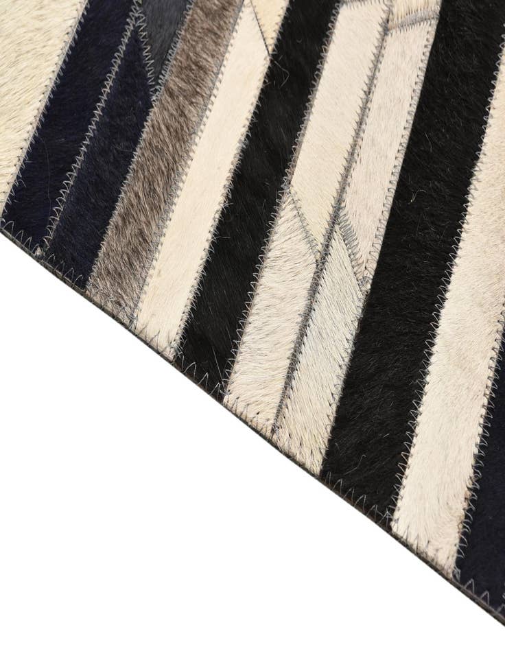 Detail image of  5' 1 x 8' 1 Cowhide Rug