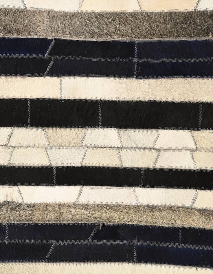 Detail image of  5' 1 x 8' 1 Cowhide Rug