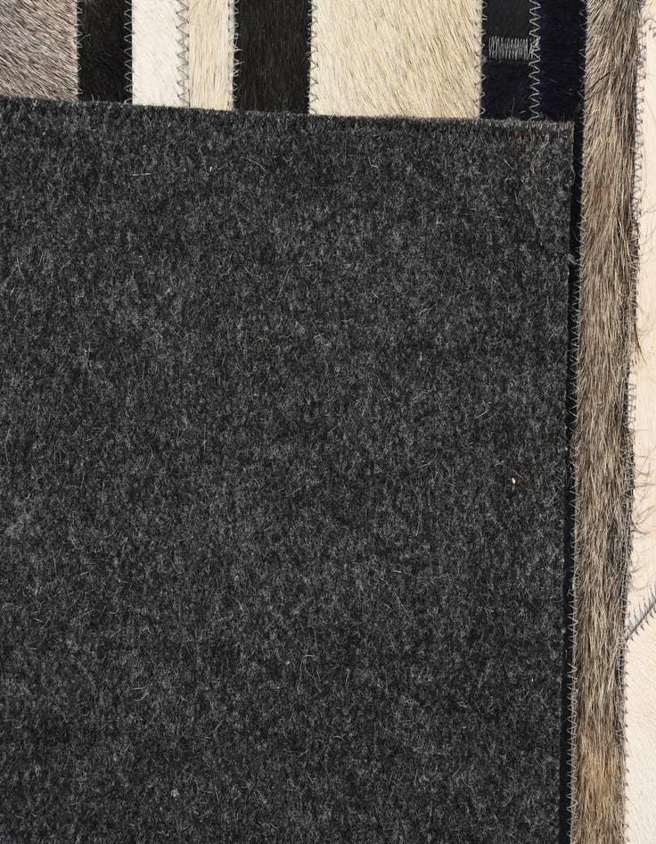 Detail image of  5' 1 x 8' 1 Cowhide Rug