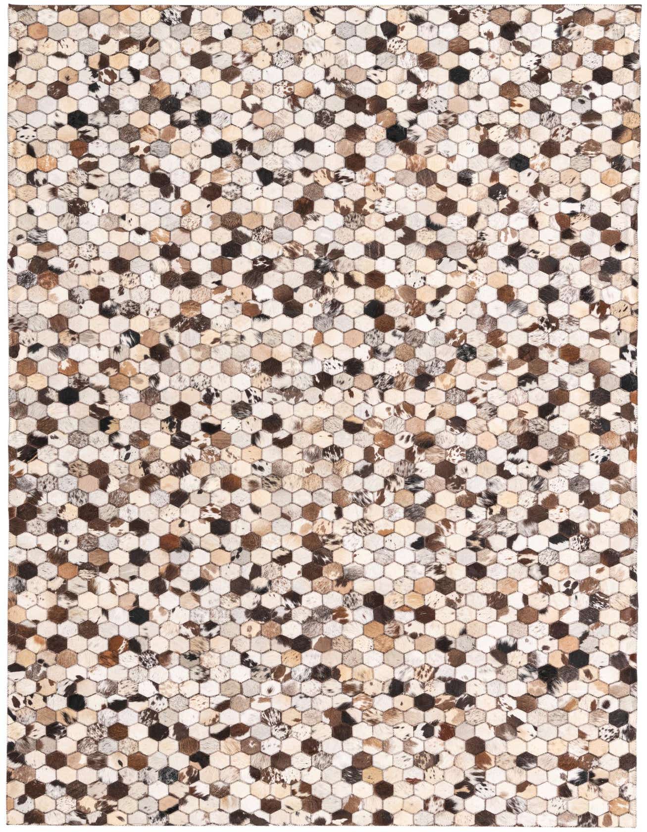 A 5x8 rectangular Cowhide rug featuring a modern honeycomb pattern in multi-colored natural cowhide patches.