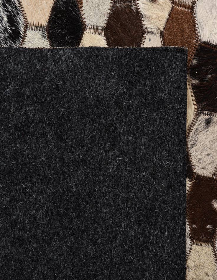 Detail image of  5' 1 x 8' 1 Cowhide Rug